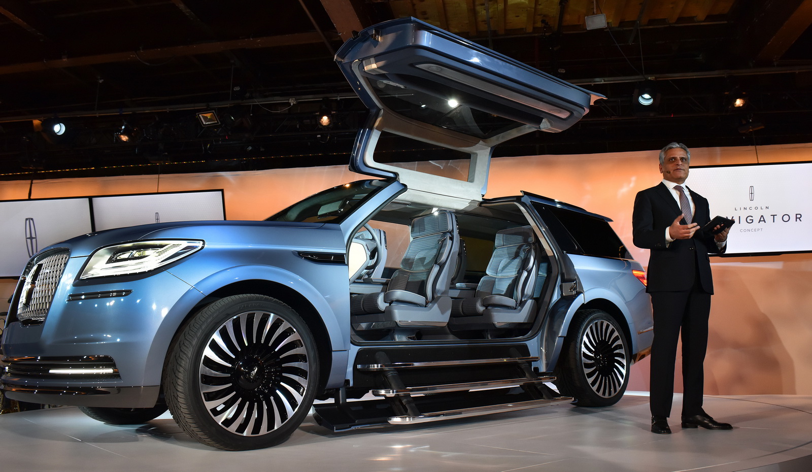 NEW YORK, March 23, 2016 - Kumar Galhotra, president of Lincoln today reveals the all-new Navigator Concept, introducing quiet luxury to full-size SUVs and offering a glimpse at what comes next for the brandâs best-known nameplate. Lincoln invented the large luxury SUV in 1997, and now is reimagining Navigator for modern clients interested in better performance, more space and further refinement. Lincoln's design team drew inspiration from luxury sailboats and yachts when designing the new concept. This influenced everything from the clean, modern lines and Storm Blue paint on the exterior that mimics the grays and blues of sea and sky, to the teak finishes, custom gear and wardrobe management system found inside. The Navigator Concept is engineered to provide drivers peace of mind. It features a 3.5-liter twin-turbo V6 engine delivering more than 400 horsepower and smart new technologies to make this SUV even more sure-footed on different road surfaces and in changing weather conditions. Photo by: Sam VarnHagen