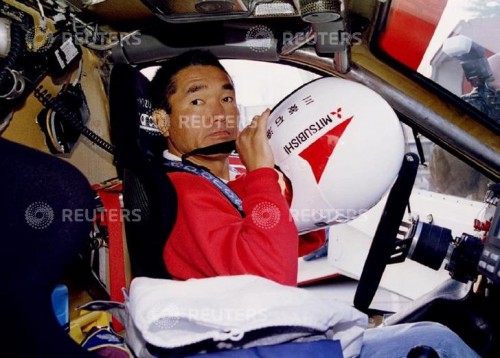 Japanese driver Kenjiro Shinosuka prepares for the Granada Dakar rally during technichals preparations in Granada December 30