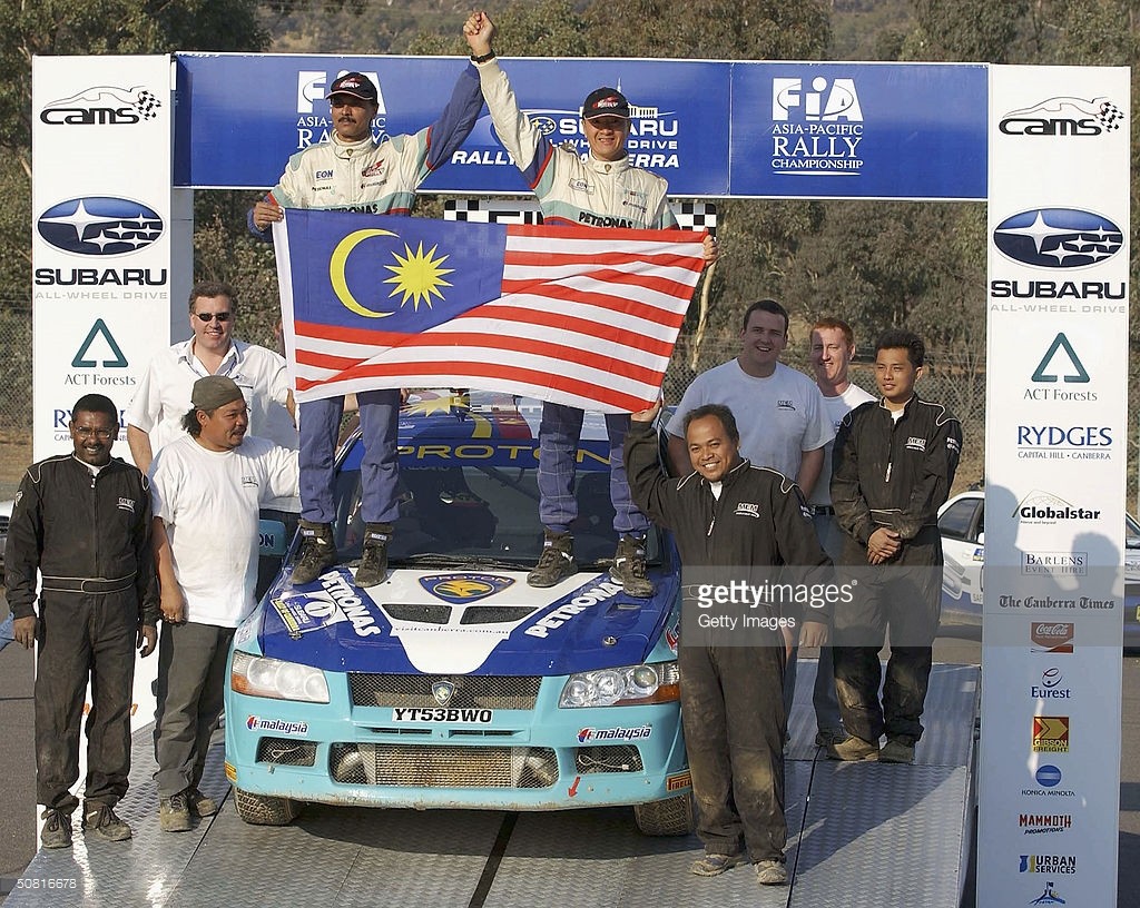 CANBERRA, AUSTRALIA - MAY 9: Karamjit Singh of Malaysia and co-driver Allen Oh of Malaysia from Team Proton Pert Malaysia win the Asia Pasific Championship section of the FIA Subaru Rally of Canberra . May 9, 2004 in Canberra, Australia. (Photo by Jamie Osborne/Getty Images) *** Local Caption *** ?Driver Name?